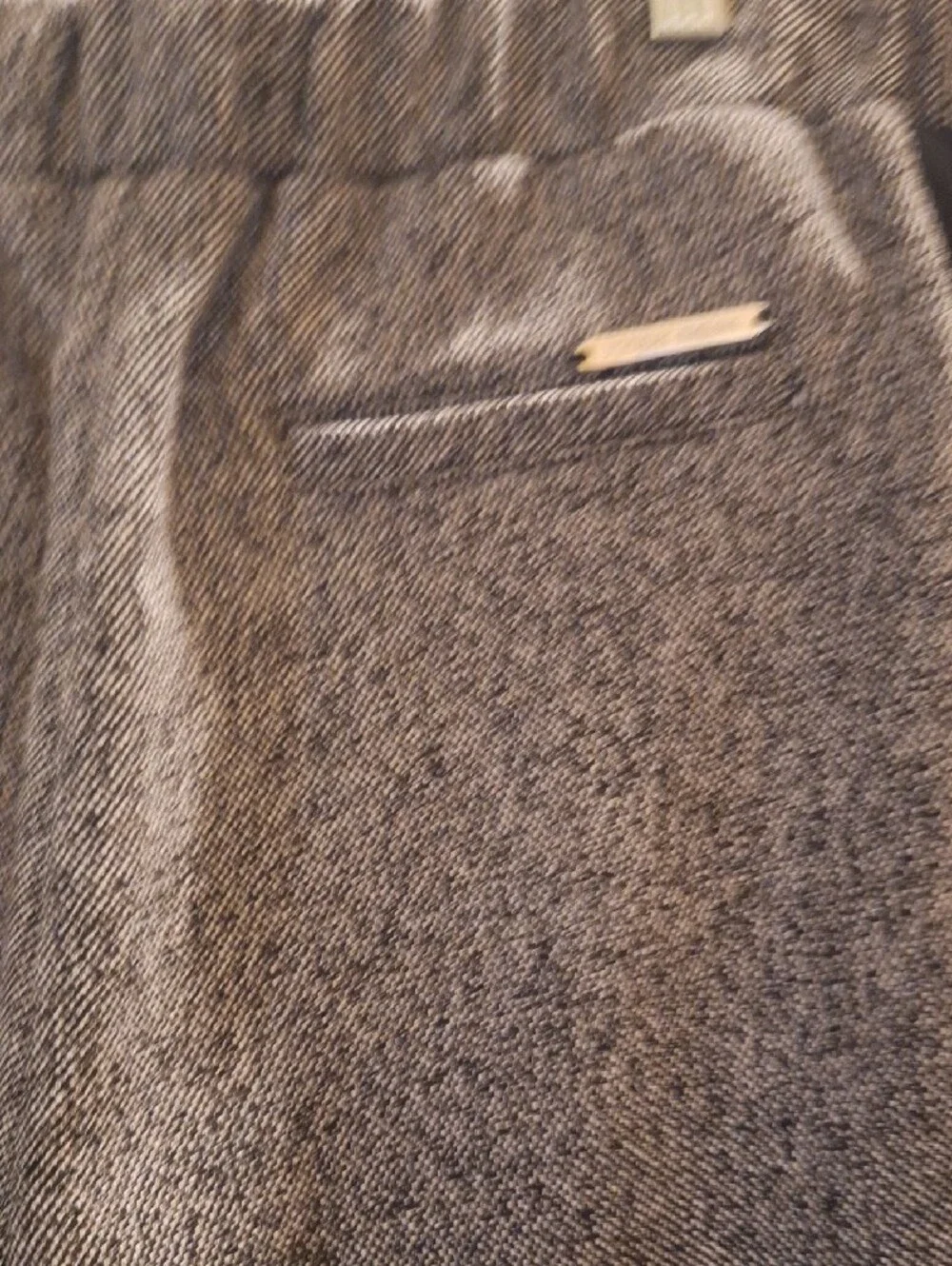 Tweed-Style Black & White ladies Pant with sporty black banding down the side.